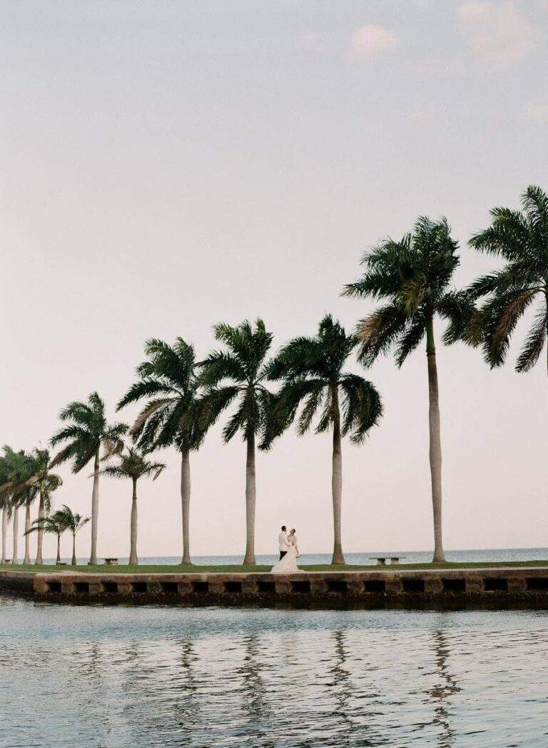 Couple at Deering Estate's Boat Basin on the south finger during twilight