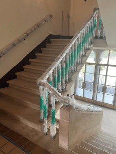 Stone House stair banisters protected with bubblewrap.