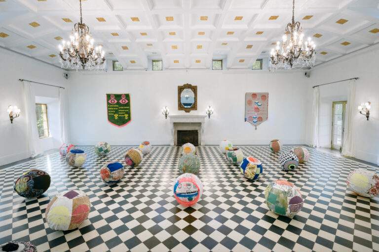 Stone House ball room decorated as one of Deering Estate's artist in residence exhibits.