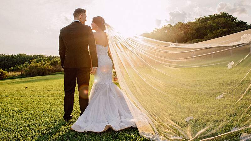 bride and groom at outdoor wedding celebration
